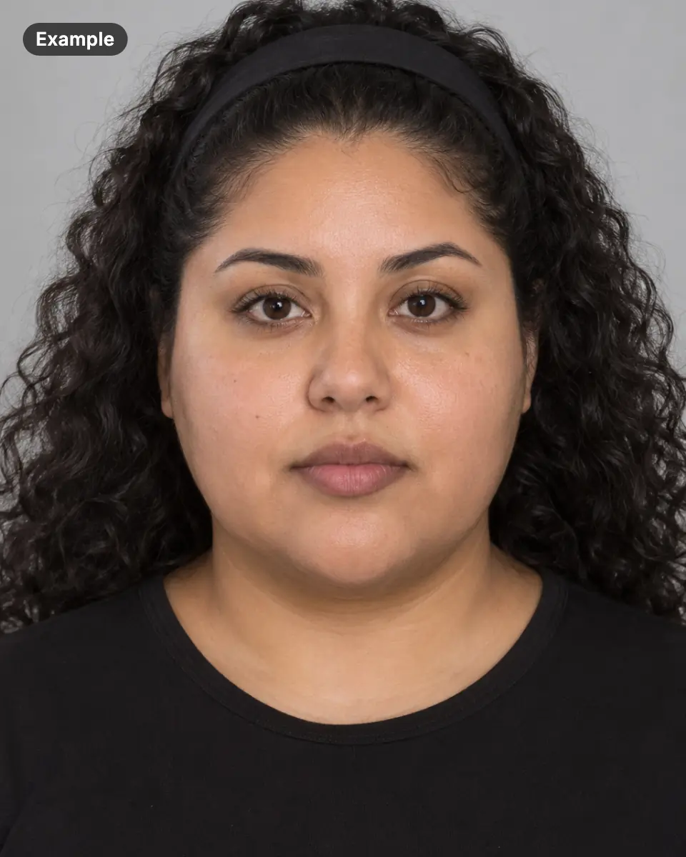 Example: portrait of an AI-generated woman, not a real person, facing the camera